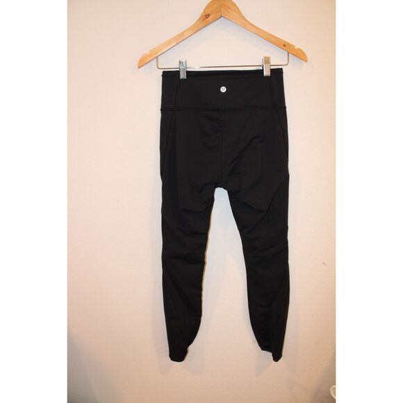 Lululemon size 6 black leggings tulip mesh side seam - Picture 4 of 6